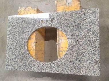 Yo'lbars terisi oq granit stol usti