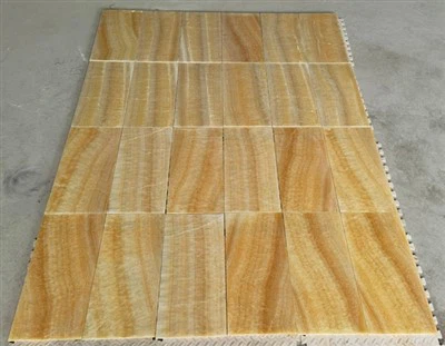 Sariq onyx plitka